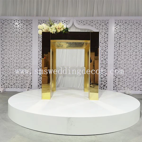 gold metal arch backdrop